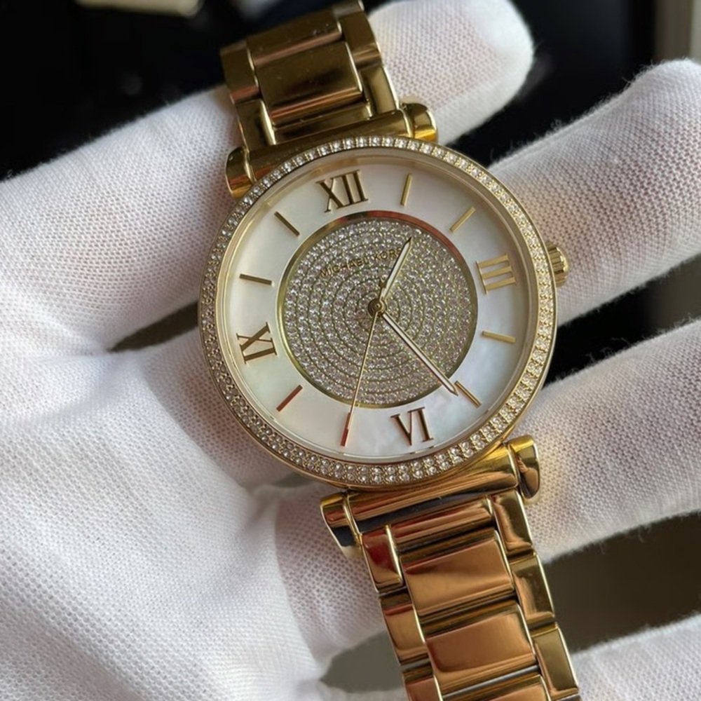 Michael Kors Gold Watch with pearl inner detail and diamonds